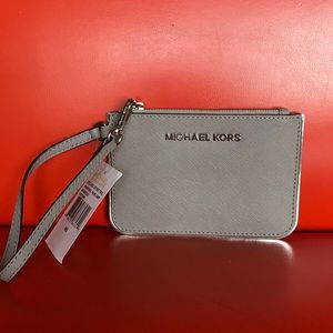 Michael Kors NWT leather wristlet in pearl grey